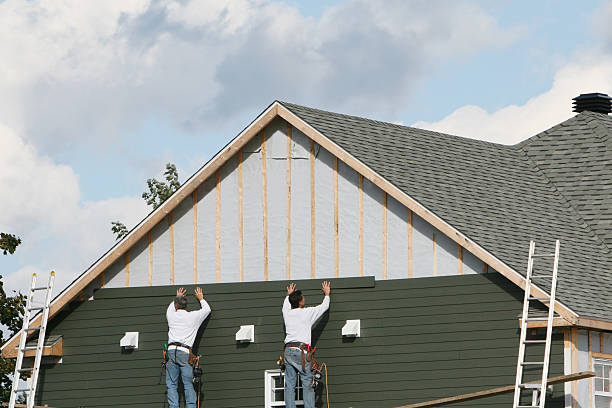 Professional Siding Installation technician working in Poquoson, VA